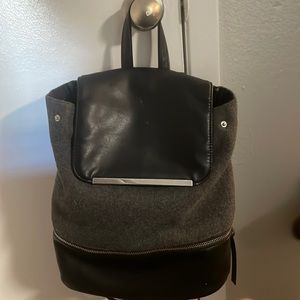 Grey and black  backpack/purse